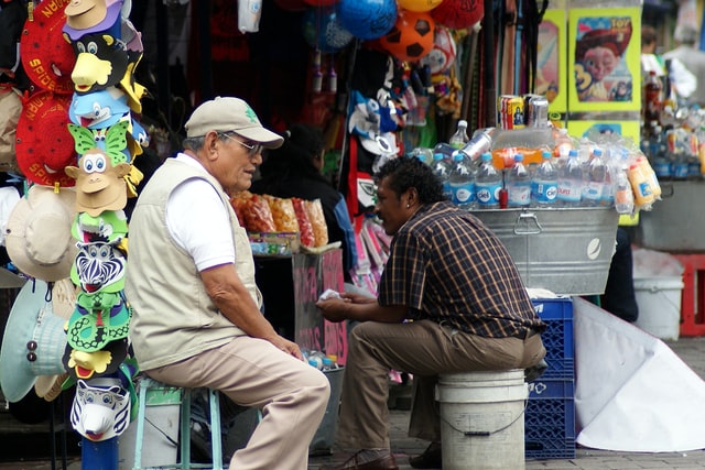 Two male street vendors in Mexico City